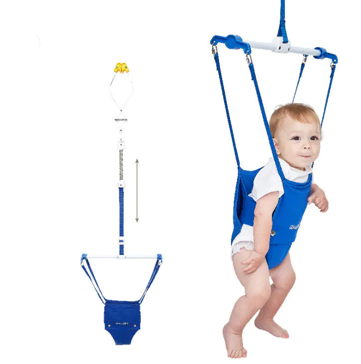 Baby in a blue harness with a white background