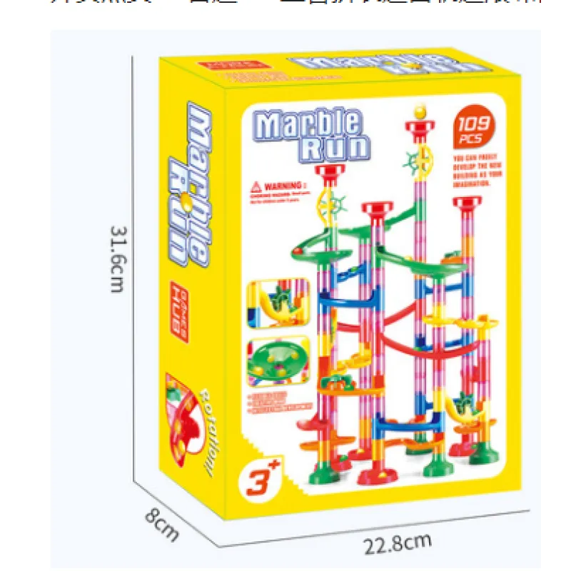 Marble run toy set packaging with dimensions on a white background